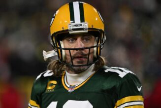 Aaron Rodgers says he will stay with the Green Bay Packers